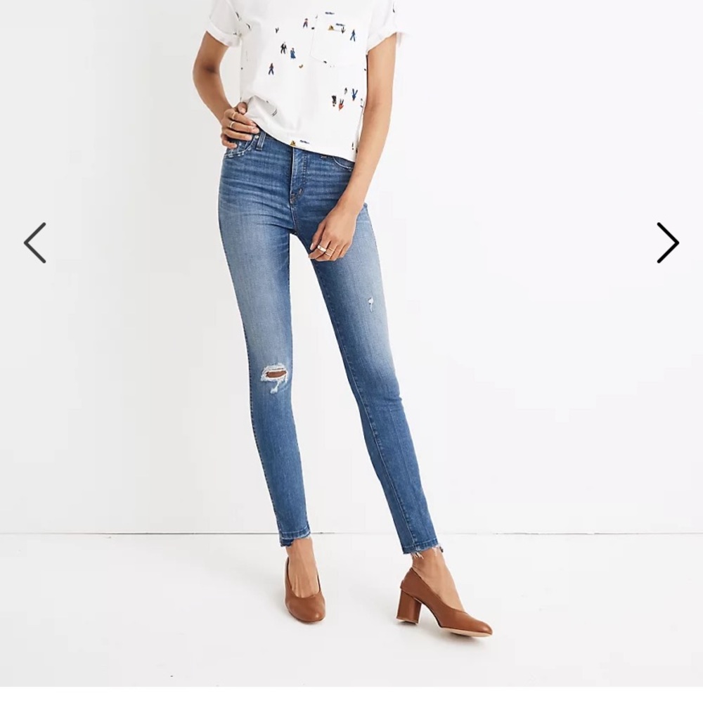 Madewell high rise skinny jeans with light distressing and step hem